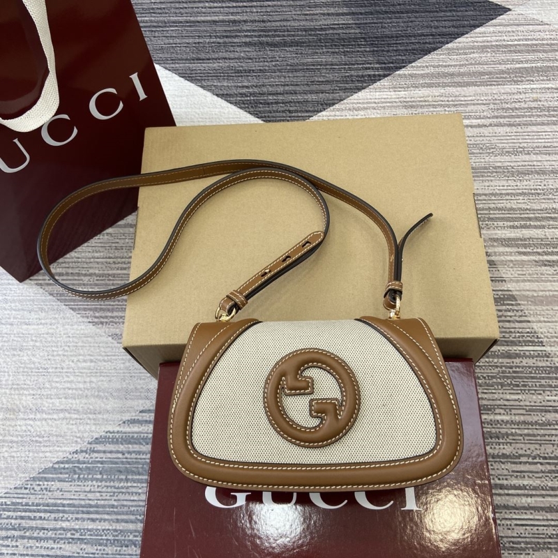 G*u*i satchel bags